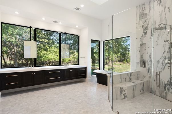 Bathroom, Dual Sink Vanities, Free Standing Baths, Glass Shower, Interior, Marble, Marble Walls, Recessed Lighting