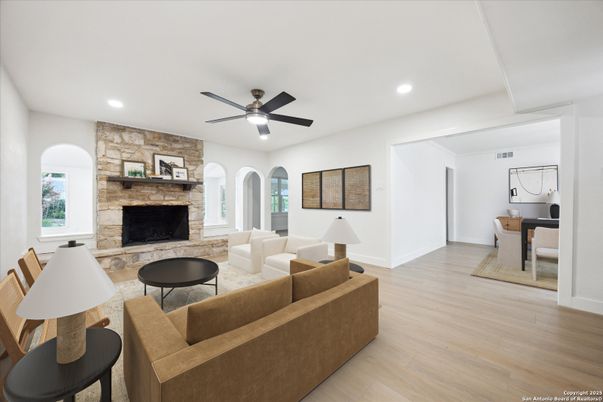 Fireplace, Interior, Living room, Recessed Lighting, Stone Walls, Wood Texture Flooring