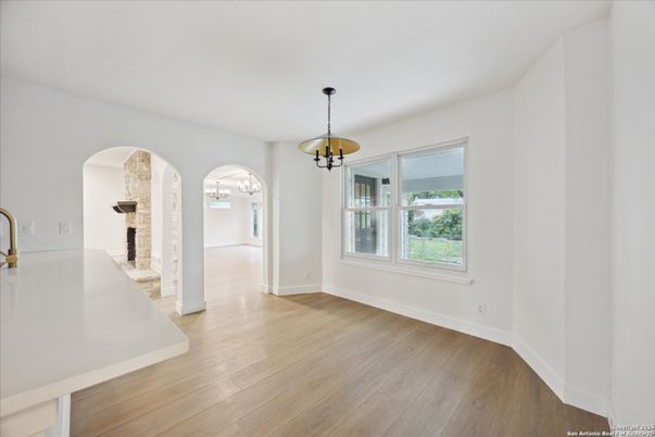 Empty room, Fireplace, Interior, Pendant Lights, Wood Texture Flooring