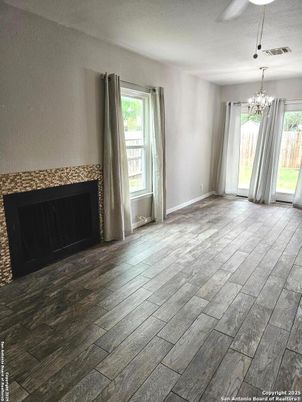 Chandelier, Empty room, Fireplace, Interior, Wood Texture Flooring