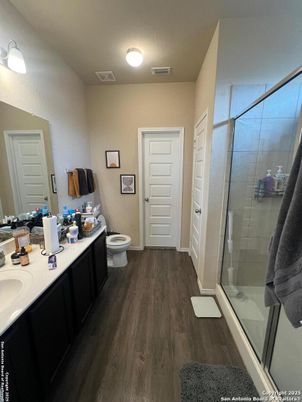 Bathroom, Dual Sink Vanities, Glass Shower, Interior, Wood Texture Flooring