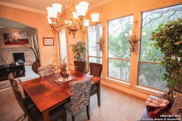Chandelier, Dining room, Fireplace, Interior, Kitchen