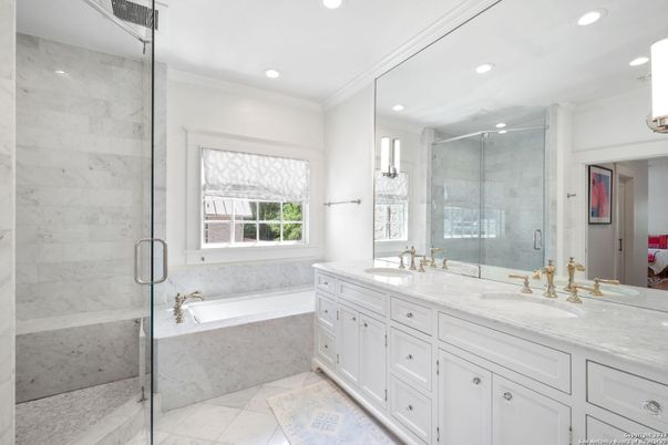 Bathroom, Dual Sink Vanities, Glass Shower, Interior, Marble Walls, Recessed Lighting