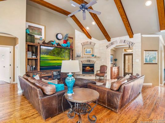 Fireplace, Interior, Living room, Recessed Lighting, Stone Walls, Wooden Beams, Wood Texture Flooring