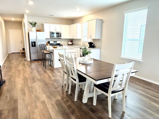 Dining room, Interior, Kitchen, Recessed Lighting, Stainless Steel Appliances, Wood Texture Flooring