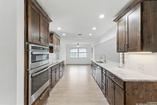 Interior, Kitchen, Recessed Lighting, Stainless Steel Appliances, Wood Texture Flooring