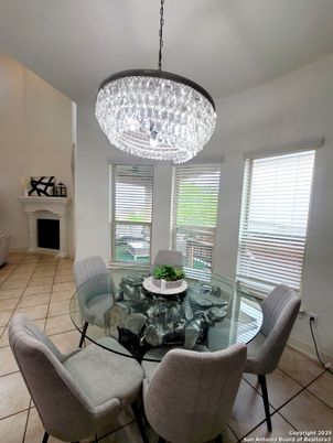 Chandelier, Dining room, Fireplace, Interior