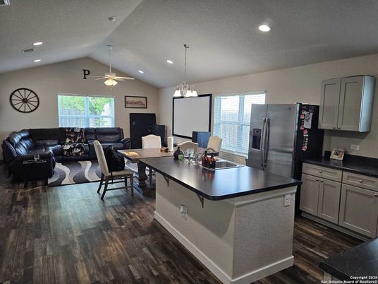 Dining room, Interior, Kitchen, Living room, Pendant Lights, Recessed Lighting, Stainless Steel Appliances, Wood Texture Flooring