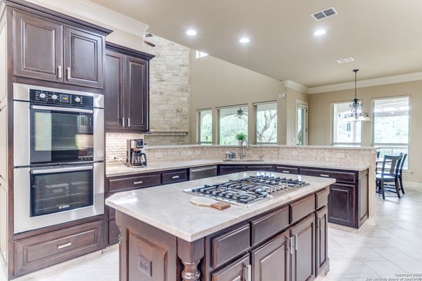 Interior, Kitchen, Pendant Lights, Recessed Lighting, Stainless Steel Appliances, Stone Walls