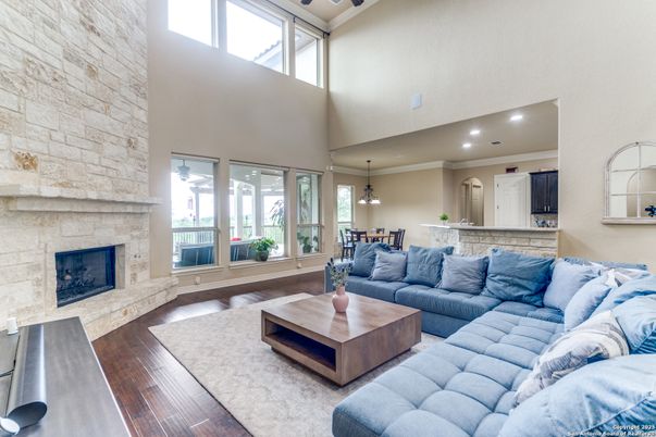 Dining room, Fireplace, Interior, Living room, Pendant Lights, Recessed Lighting, Stone Walls, Wood Texture Flooring