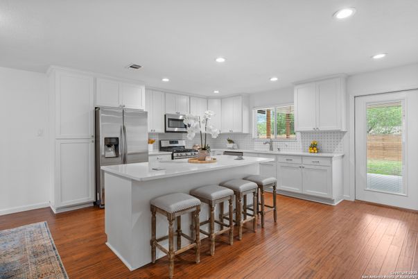Interior, Kitchen, Recessed Lighting, Stainless Steel Appliances, Wood Texture Flooring