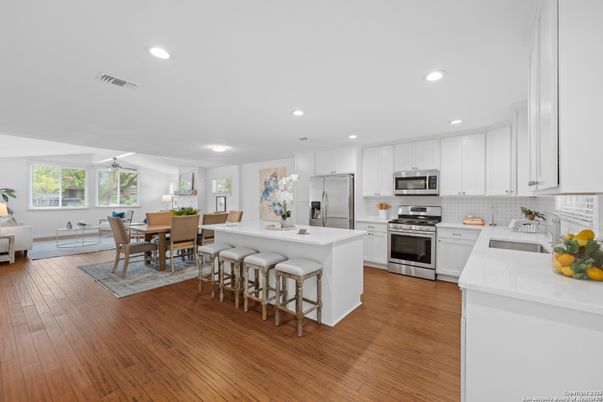 Dining room, Interior, Kitchen, Living room, Recessed Lighting, Stainless Steel Appliances, Wood Texture Flooring