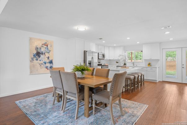 Dining room, Interior, Kitchen, Recessed Lighting, Stainless Steel Appliances, Wood Texture Flooring