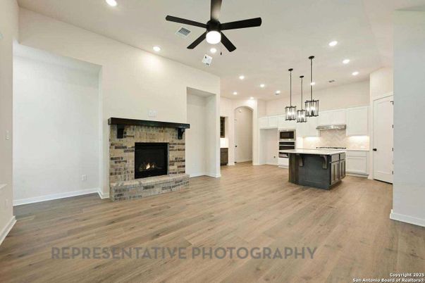 Empty room, Fireplace, Interior, Kitchen, Pendant Lights, Recessed Lighting, Wood Texture Flooring