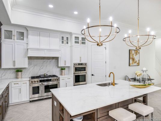 Chandelier, Interior, Kitchen, Marble Walls, Pendant Lights, Recessed Lighting, Stainless Steel Appliances