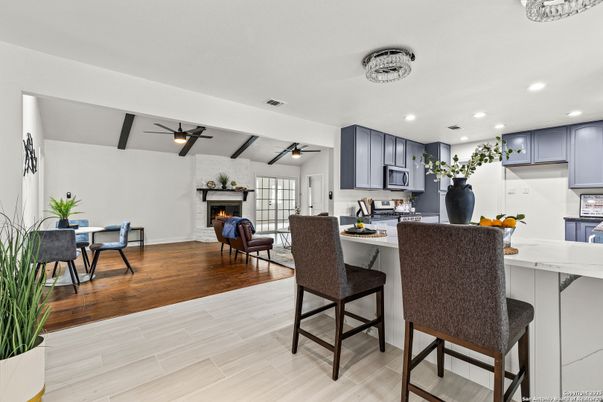 Dining room, Fireplace, Interior, Kitchen, Living room, Recessed Lighting, Wood Texture Flooring