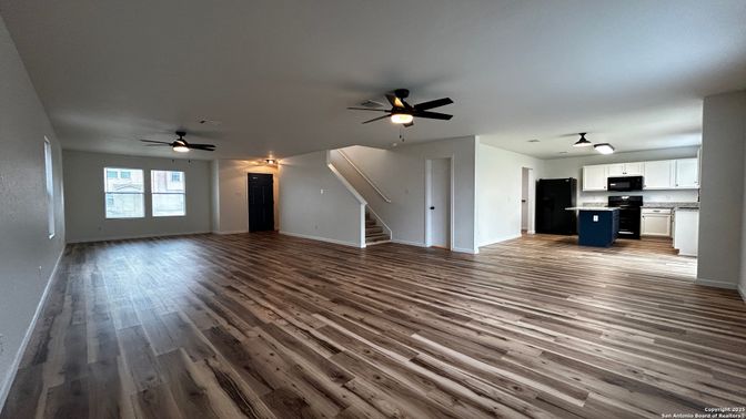 Empty room, Interior, Kitchen, Stainless Steel Appliances, Wood Texture Flooring