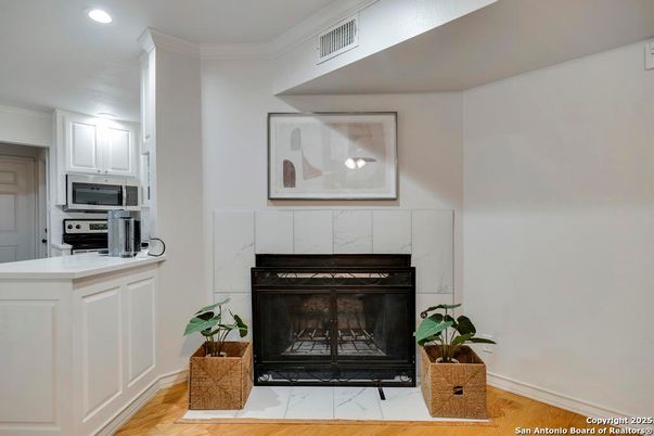 Fireplace, Interior, Kitchen, Recessed Lighting, Wood Texture Flooring