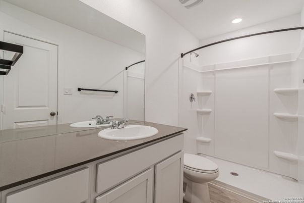 Bathroom, Dual Sink Vanities, Interior, Recessed Lighting, Wood Texture Flooring