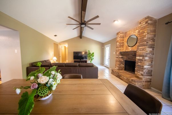 Dining room, Fireplace, Interior, Living room, Recessed Lighting, Stone Walls