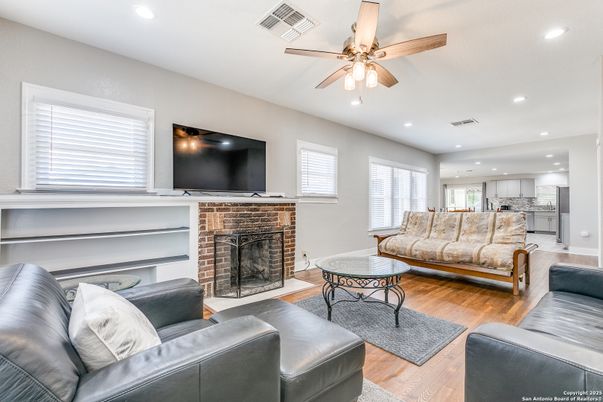 Fireplace, Interior, Living room, Recessed Lighting, Wood Texture Flooring