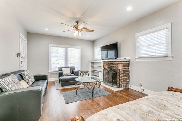 Fireplace, Interior, Living room, Recessed Lighting, Wood Texture Flooring
