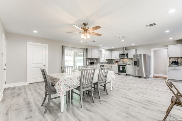 Dining room, Interior, Kitchen, Recessed Lighting, Stainless Steel Appliances, Wood Texture Flooring