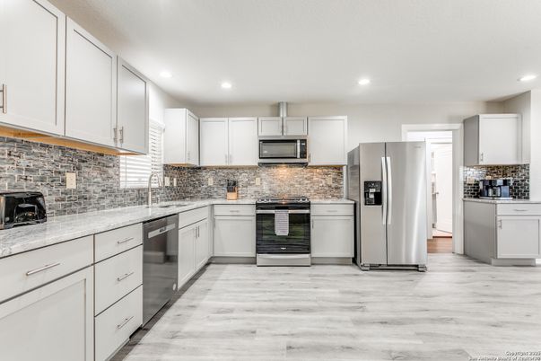 Interior, Kitchen, Recessed Lighting, Stainless Steel Appliances, Wood Texture Flooring