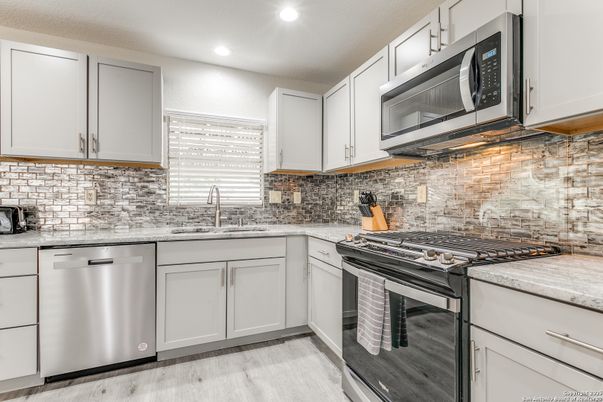 Interior, Kitchen, Recessed Lighting, Stainless Steel Appliances, Wood Texture Flooring