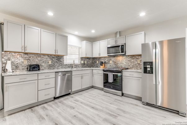 Interior, Kitchen, Recessed Lighting, Stainless Steel Appliances, Wood Texture Flooring