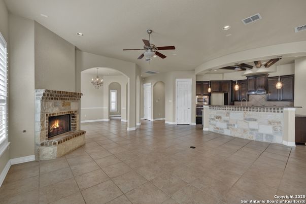 Chandelier, Fireplace, Interior, Kitchen, Pendant Lights, Recessed Lighting, Stainless Steel Appliances
