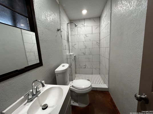 Bathroom, Glass Shower, Interior, Marble Walls, Recessed Lighting, Wood Texture Flooring