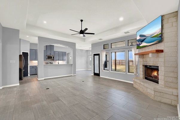 Empty room, Fireplace, Interior, Kitchen, Recessed Lighting, Wood Texture Flooring