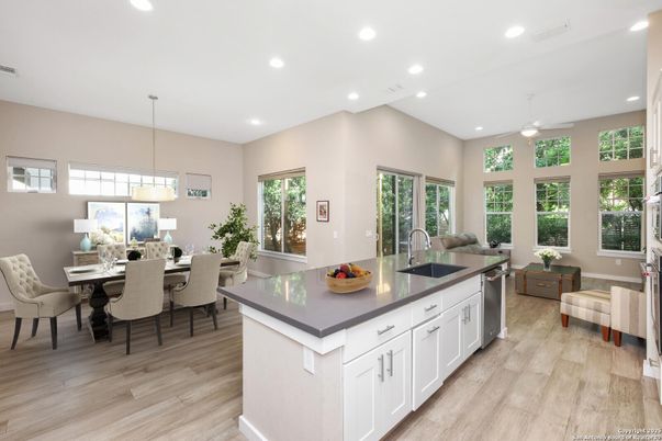 Dining room, Interior, Kitchen, Pendant Lights, Recessed Lighting, Stainless Steel Appliances, Wood Texture Flooring