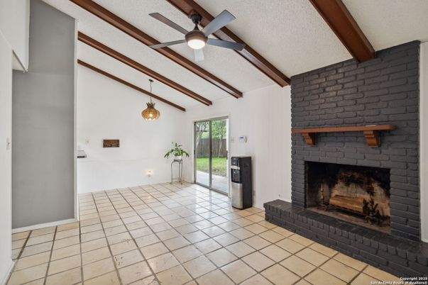 Empty room, Fireplace, Interior, Pendant Lights, Stone Walls, Wooden Beams