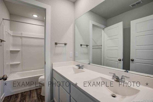 Bathroom, Dual Sink Vanities, Interior, Recessed Lighting, Wood Texture Flooring