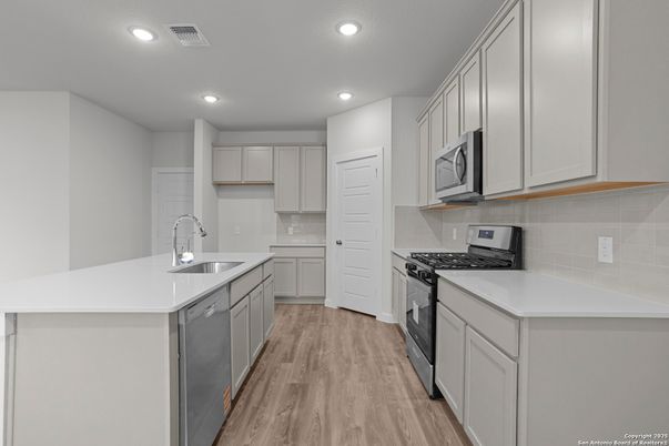 Interior, Kitchen, Recessed Lighting, Stainless Steel Appliances, Wood Texture Flooring