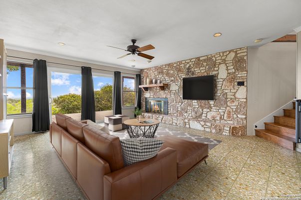 Dining room, Fireplace, Interior, Living room, Recessed Lighting, Stone Walls