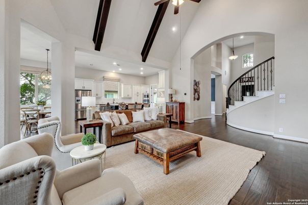 Dining room, Interior, Kitchen, Living room, Pendant Lights, Recessed Lighting, Stainless Steel Appliances, Wooden Beams, Wood Texture Flooring