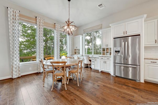 Dining room, Interior, Kitchen, Pendant Lights, Stainless Steel Appliances, Wood Texture Flooring