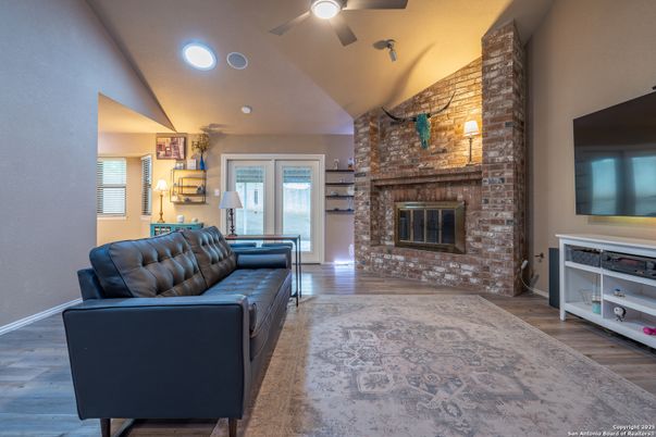 Fireplace, Interior, Recessed Lighting, Stone Walls, Wood Texture Flooring
