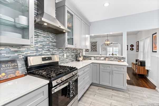 Chandelier, Interior, Kitchen, Pendant Lights, Recessed Lighting, Stainless Steel Appliances, Wood Texture Flooring
