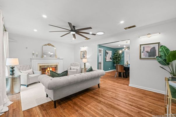 Dining room, Fireplace, Interior, Living room, Recessed Lighting, Wood Texture Flooring