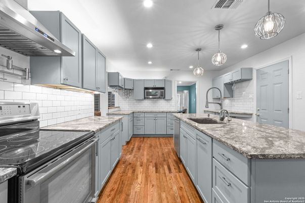 Interior, Kitchen, Pendant Lights, Recessed Lighting, Stainless Steel Appliances, Wood Texture Flooring