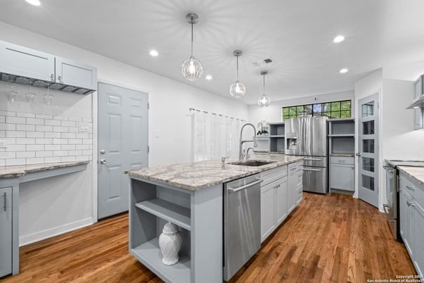 Interior, Kitchen, Pendant Lights, Recessed Lighting, Stainless Steel Appliances, Wood Texture Flooring
