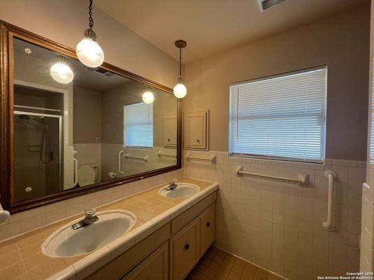 Bathroom, Dual Sink Vanities, Interior, Pendant Lights, Tile Countertops