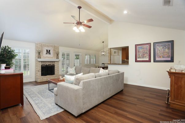 Fireplace, Interior, Living room, Pendant Lights, Recessed Lighting, Stone Walls, Wood Texture Flooring