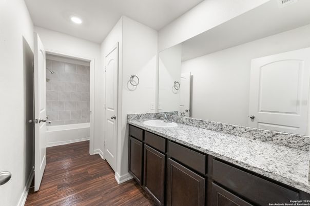 Bathroom, Dual Sink Vanities, Interior, Recessed Lighting, Wood Texture Flooring