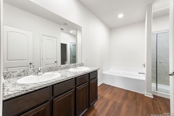 Bathroom, Dual Sink Vanities, Interior, Recessed Lighting, Wood Texture Flooring
