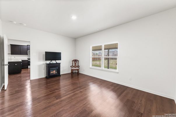Empty room, Fireplace, Interior, Recessed Lighting, Wood Texture Flooring